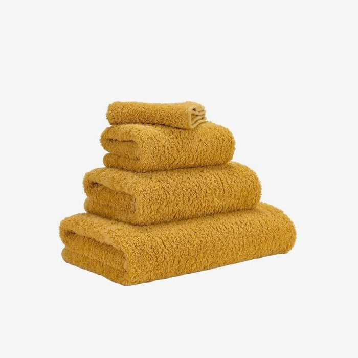 Abyss Super Pile Bath Sheet 40x72 Safran 850 - View 2 at Fig Linens and Home