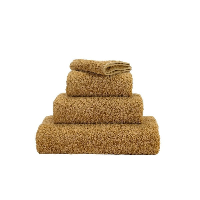 Abyss Super Pile Bath Towel 28x54 Gold 840 - View 1 at Fig Linens and Home