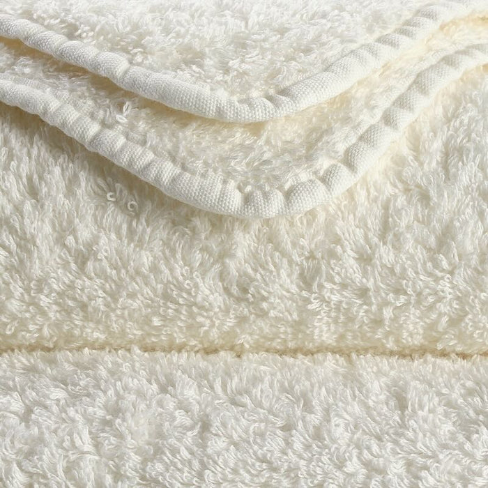 Abyss Super Pile Wash Cloth 12x12 Ivory 103 - Swatch at Fig Linens and Home