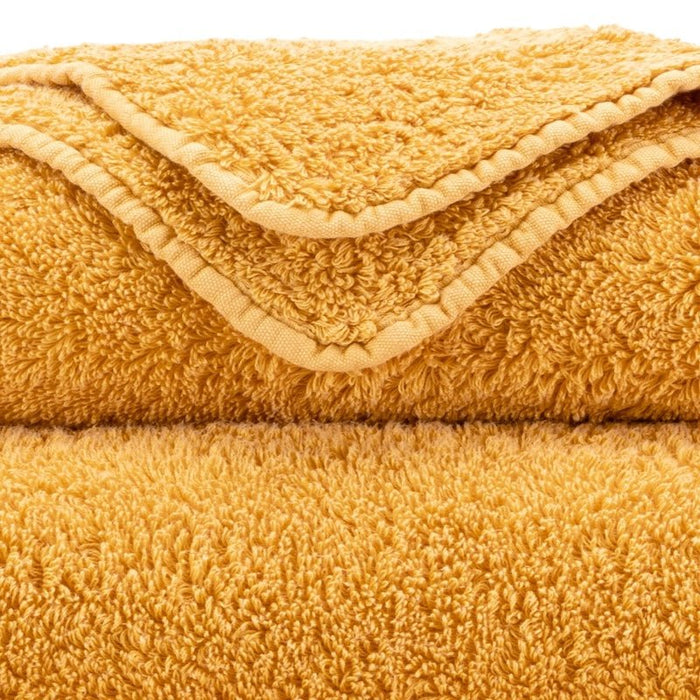 Abyss Super Pile Wash Mitt 7x9 Curcuma 870 - Swatch at Fig Linens and Home