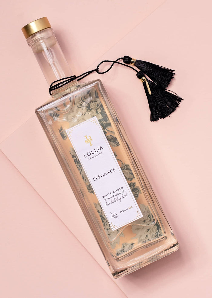 lollia elegance bubble bath on a pink background