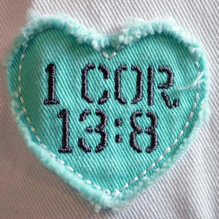 Love Never Fails Cap
