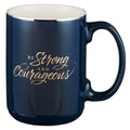 Navy blue mug with 'Be Strong and Courageous' text in gold on a white background