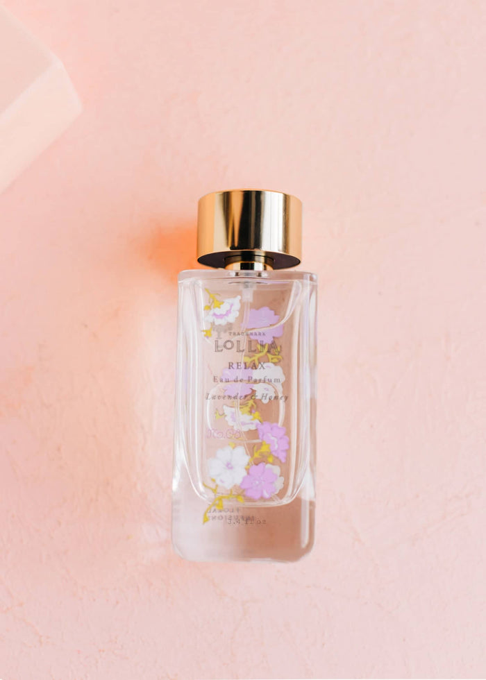 lollia relax perfume on a pink background