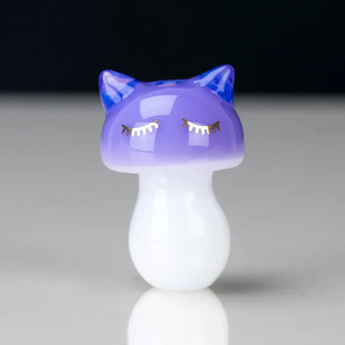 Glossy purple sakibomb kitty head carb cap with blue ears and gold lashes