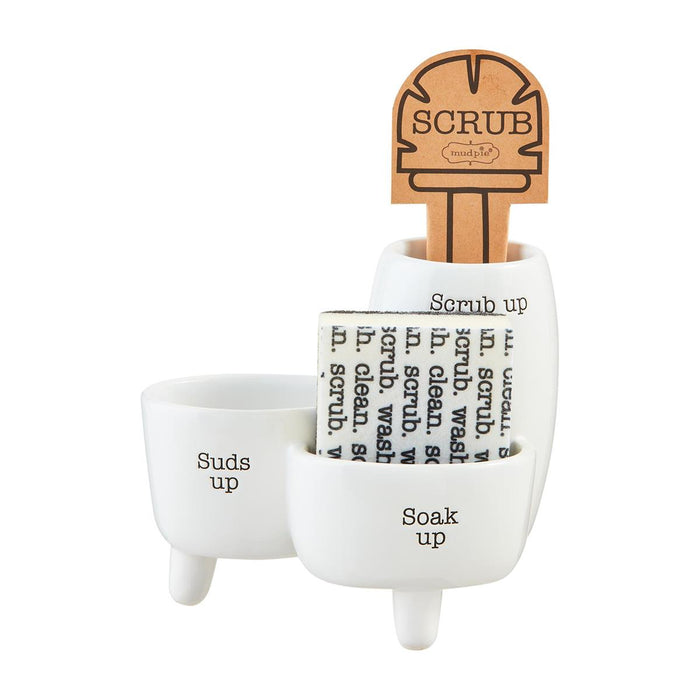 White ceramic scrubber holder with text and wooden scrubber on a white background