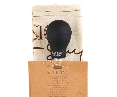 Black stuffing baster with a decorative label on a white background