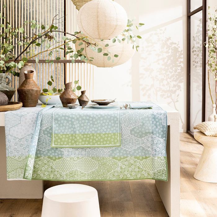 Wagara Green 59" x 59" Coated Tablecloth by Le Jacquard Français - 9at Fig Linens and Home - 1